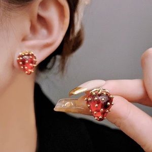 - Katespade strawberry earrings